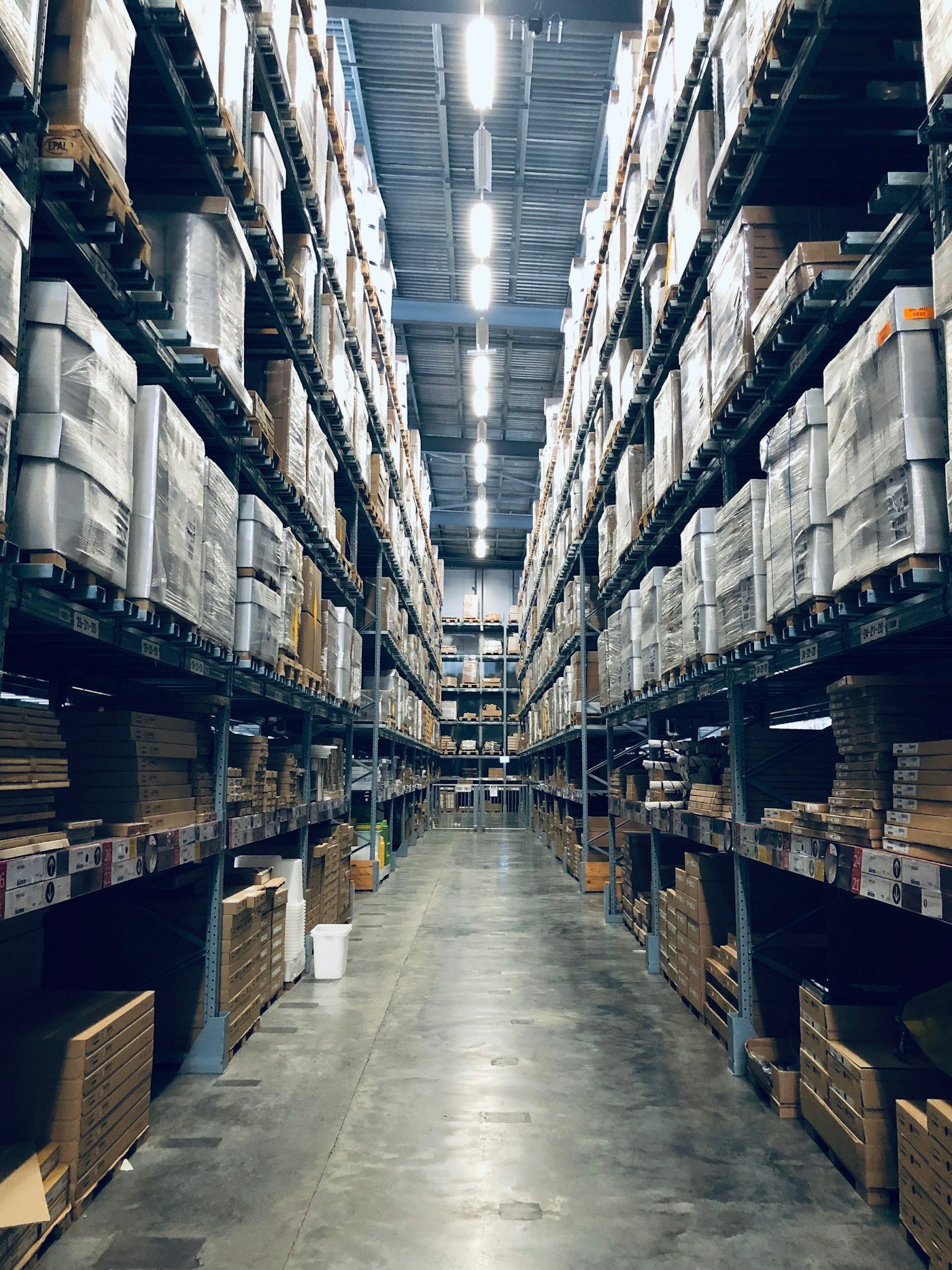 Concrete floor slab and structure inside a large commercial warehouse build